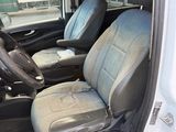 a picture of a car with two seats and a steering wheel