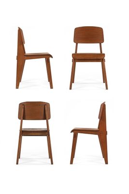 four different chairs are arranged in a row on a white surface