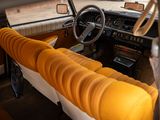 a view of the inside of a car with a steering wheel