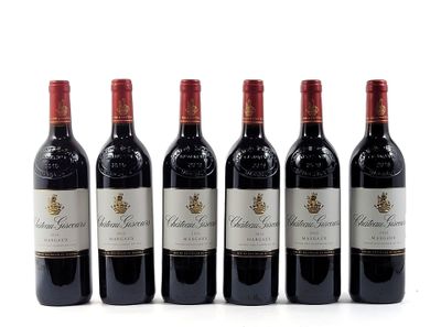 six bottles of red wine are lined up in a row