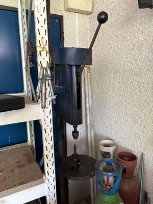 a machine that is sitting on a shelf in a room