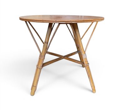 a close up of a round table with a wooden top