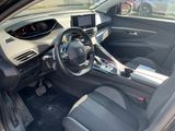 the interior of a car with a steering wheel and dashboard