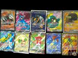 a lot of pokemon cards that are on the table