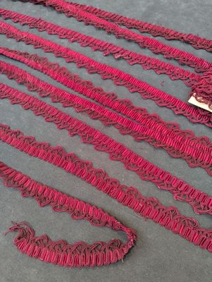 a lot of red laces on a table