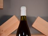 a bottle of wine that is sitting on a table