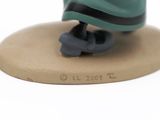 a small figurine of a person on a skateboard