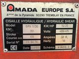an image of a sign on the side of a red machine