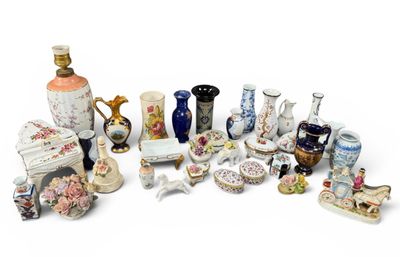 many different types of vases and other items on the table