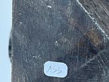 a piece of wood that has a sticker on it