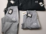 deux paires de pantalons de survêtement Under Armour pour homme et une paire de pantalons de survêtement Under Armour