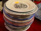 several plates stacked on top of each other on a table