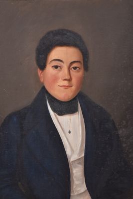 portrait of a young man in a blue coat and white shirt