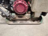 a close up of a small engine on the ground
