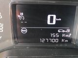 a digital display on the dashboard of a car