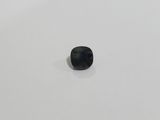 a square black diamond on a white surface