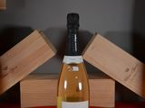 a bottle of wine that is sitting on a table