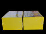 two boxes that are sitting side by side on a black background
