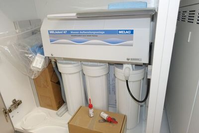 an image of a water filtrator in a small room