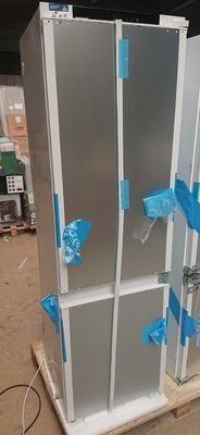 an image of a refrigerator in a warehouse with blue tape on the doors