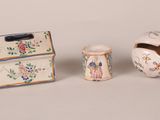 three different types of vases sitting on a table next to each other