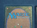 two decks of magic the gathering are on display on a table