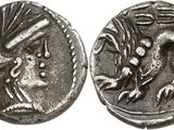 a silver coin with an image of a dragon on it