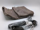 a purse and a keychain sitting on a table