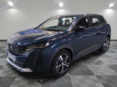 a blue 2021 toyota c - hr is shown in a showroom