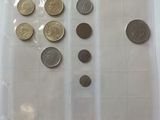 a lot of coins in the bag on the table