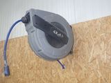 a hose that is connected to a wall with a cord