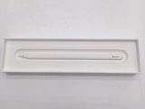 an image of a pencil in a box on a table