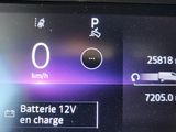a picture of a car ' s dashboard showing the battery life