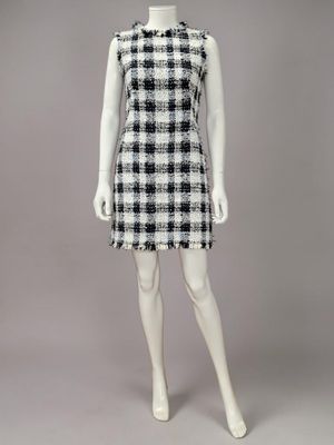 a mannequin dress with a black and white checkered pattern