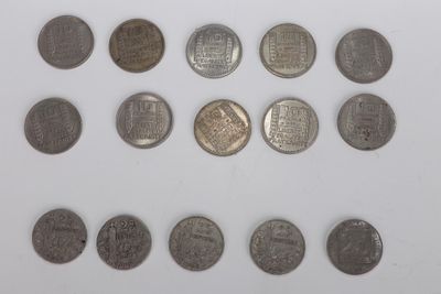 an image of a group of coins on a white surface