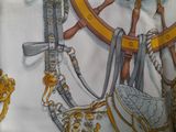 a close up of a painting of a steering wheel and a purse