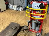 a machine that is sitting on the floor in a room