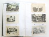 an open book with pictures of buildings and a clock tower