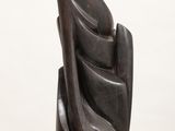 an image of a sculpture of a woman ' s head on a white pedestal