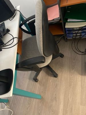 a desk with a computer and a monitor on it
