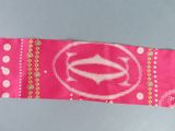 an image of a pink and white belt with a design on it
