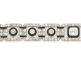 a close up of a black and white diamond bracelet