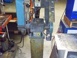 a machine that is sitting in a room with many tools