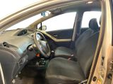 the interior of a car with the door open and the driver ' s seat up