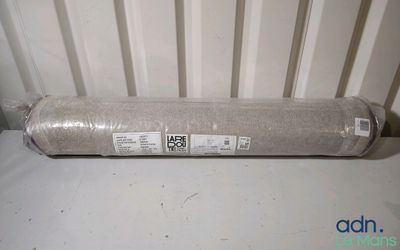 a roll of fabric sitting on top of a radiator