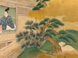 a painting on the wall of a room with a painting on the wall