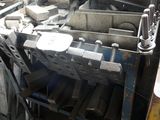 a picture of a machine that is sitting in a garage