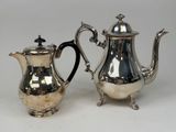 silver plated coffee pot and creamer on stand