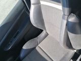 a seat in the back of a car that is empty