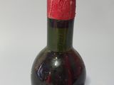 a bottle of wine that is sitting on a table